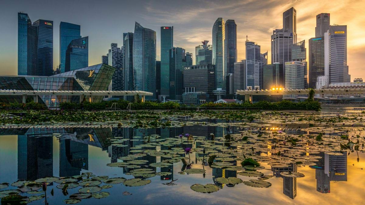 high rise buildings near body of water during daytime